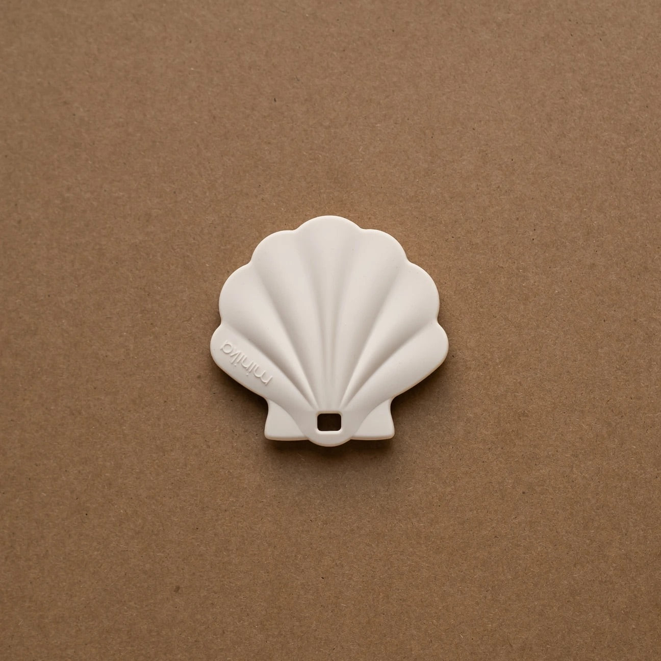 Minika - Coquillage de dentition, shell